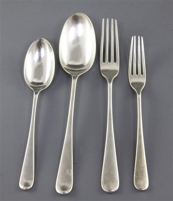 An Edwardian part canteen of silver Hanovarian rat tail flatware by Elkington & Co, 120 oz.